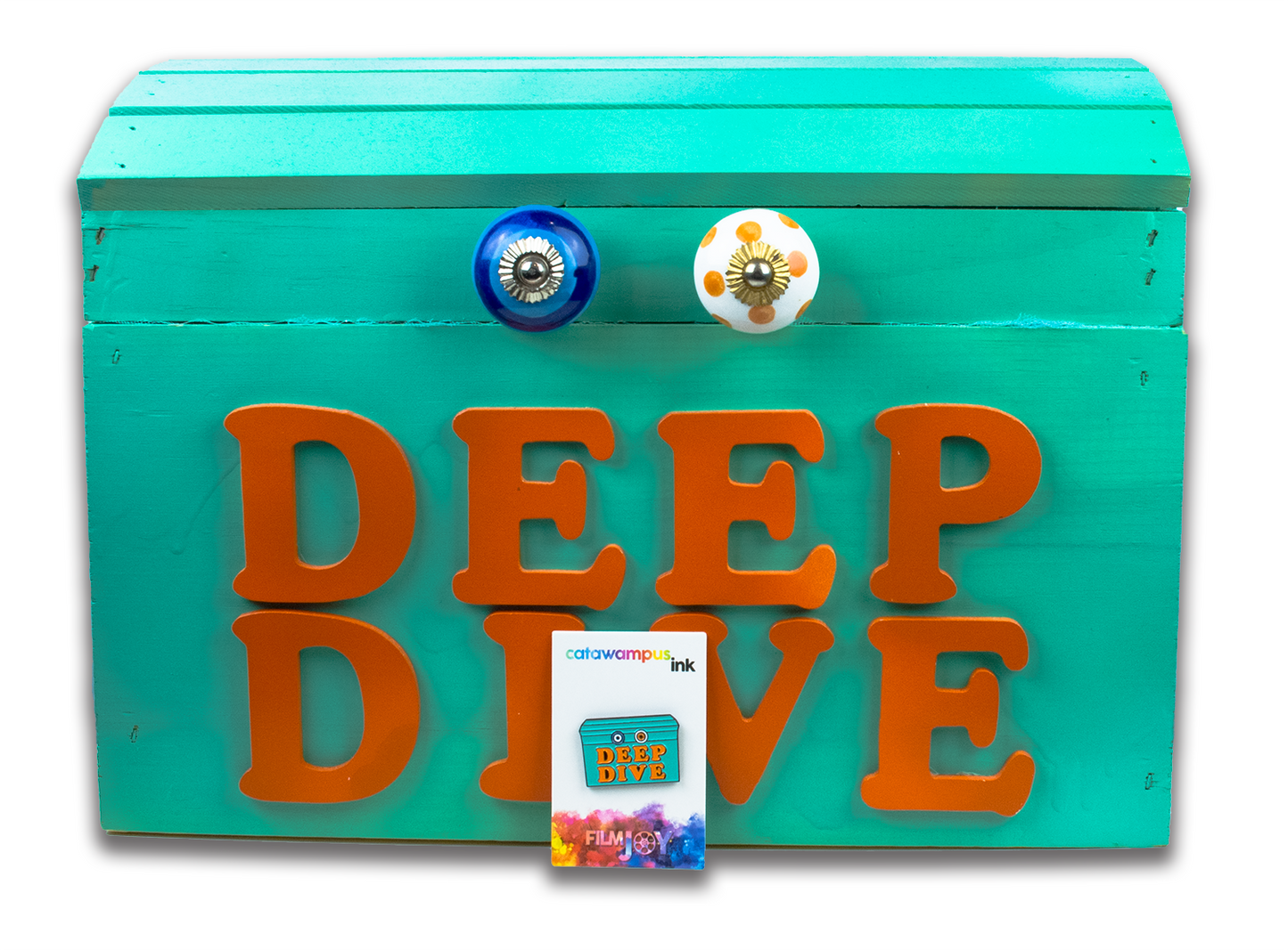 The real life Deep Dive chest with the pin version next to it.